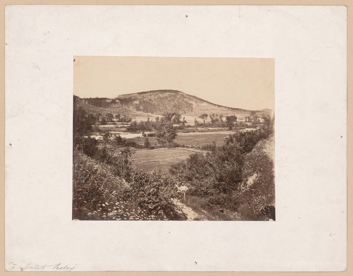 View of Dutch Valley with a man holding a rake in the foreground, New Brunswick [?]