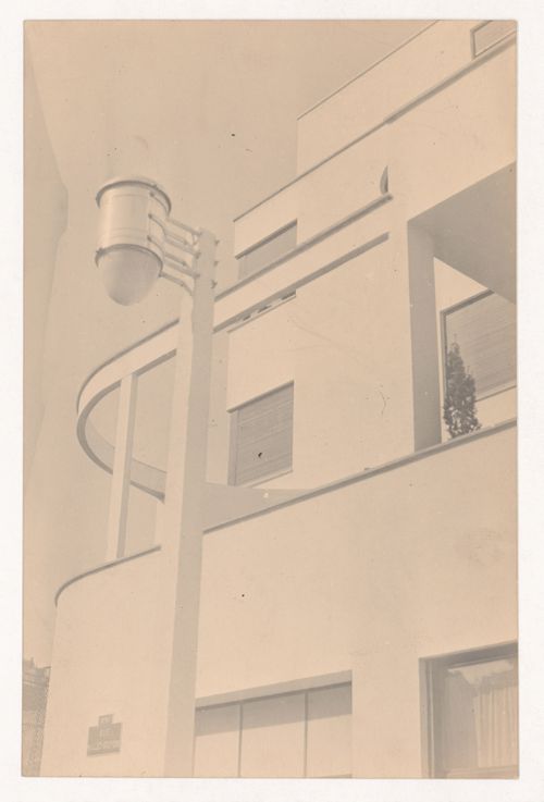 Partial view of a streetlamp and exterior of the Mallet-Stevens hôtel particulier, Mallet-Stevens road in the 16th arrondissement, Paris, France