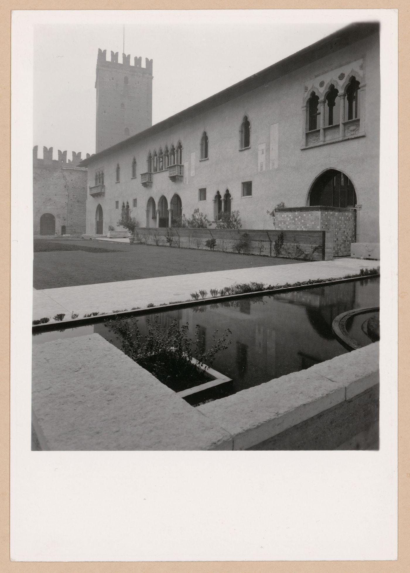 View of the courtyard showing a pool and the Torre del Mastio, Museo di Castelvecchio, Verona, Italy