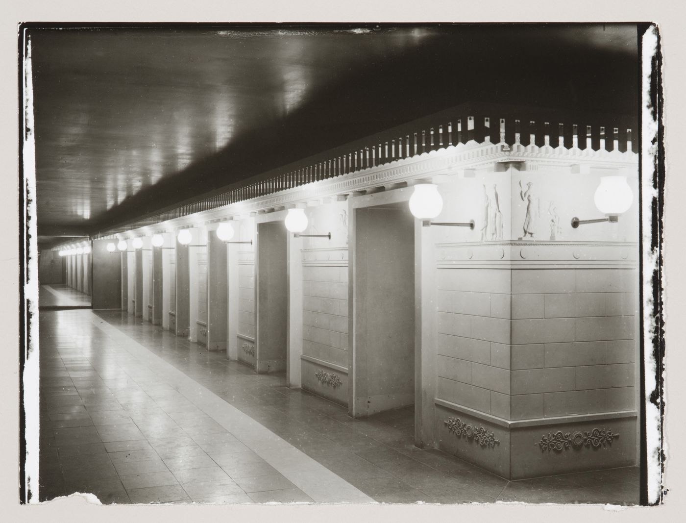 Interior view of the lower corridor of Skandia Cinema showing doorways and lighting fixtures, Stockholm