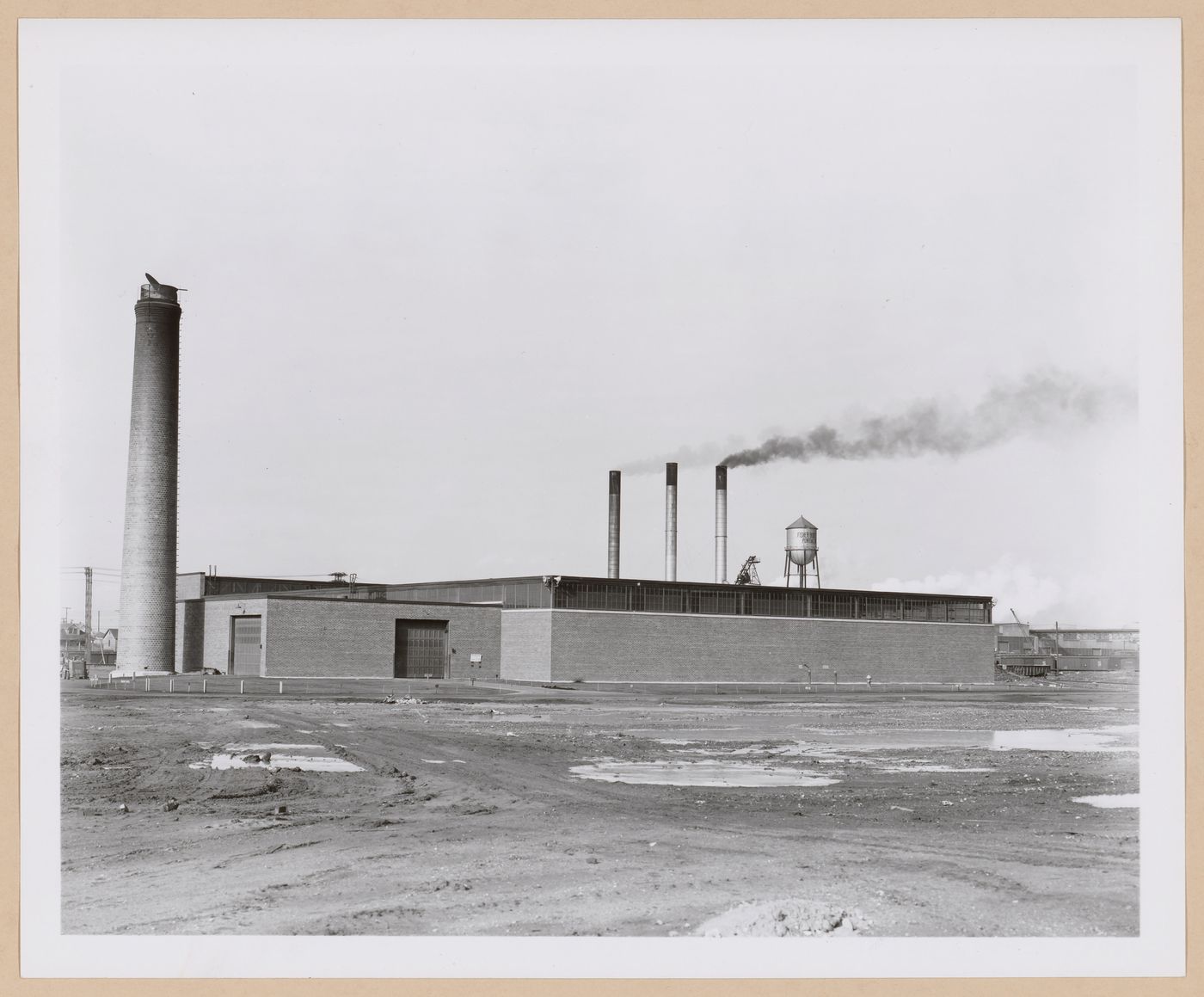 View of the principal and lateral façades of the Salvage and Incinerator Building, General Motors Corporation Pontiac Motor division Assembly Plant, Pontiac, Michigan