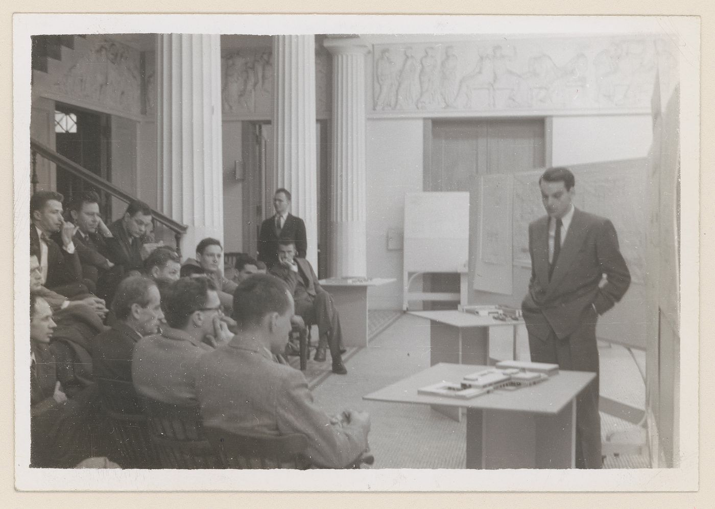 Parkin giving presentation to classroom, possibly at Harvard