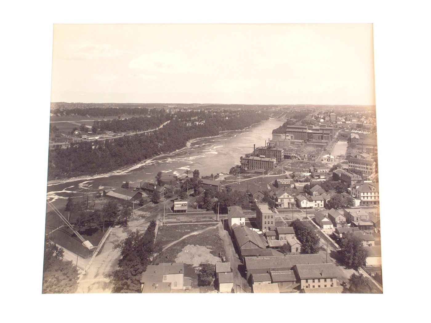 View looking down: town by river