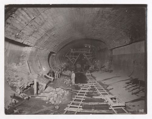 Construction of the Paris Metro, interior view of the tunnel with workers and tracks, Paris, France