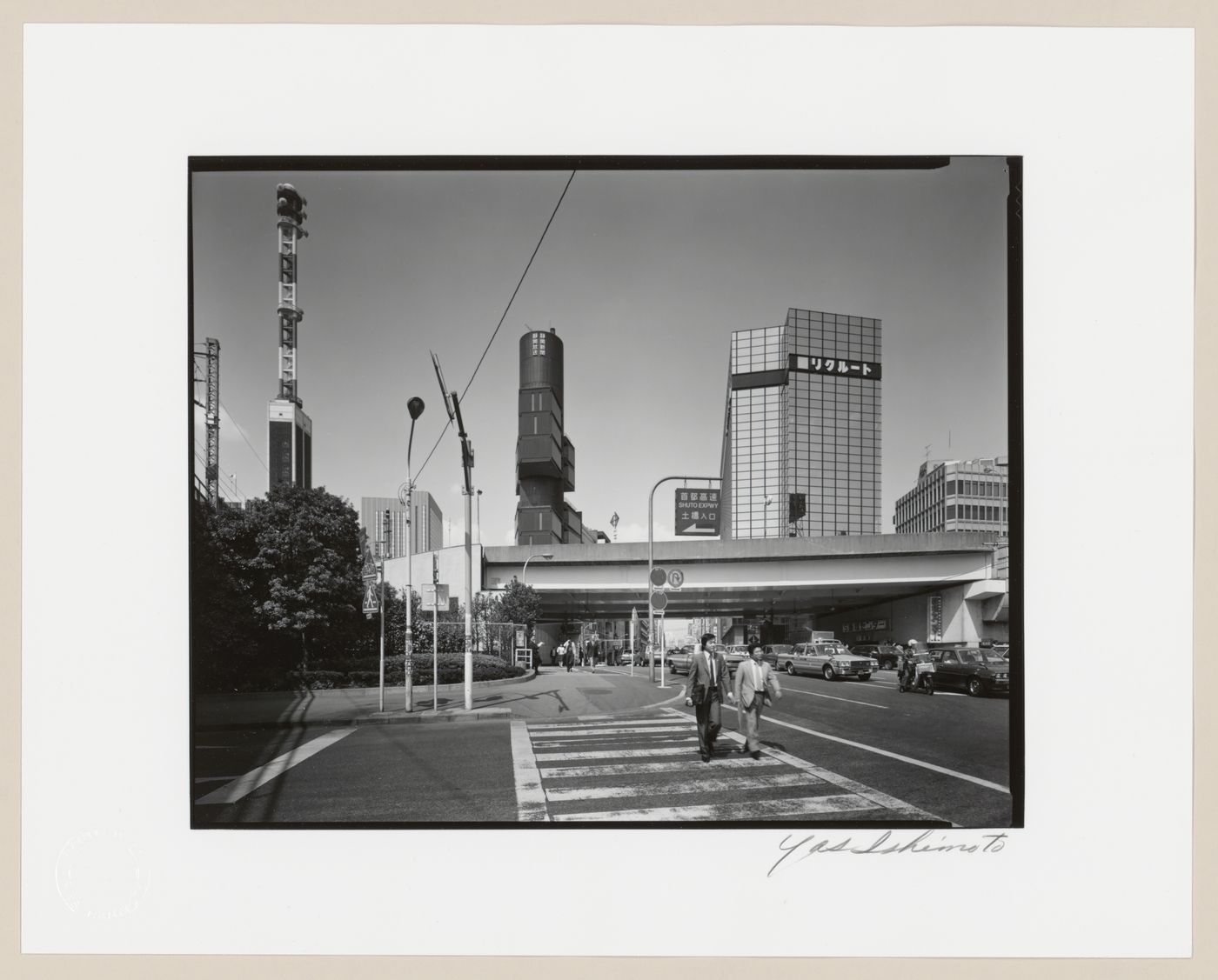 View of the Shizuoka Press and Broadcasting Centre and other buildings, an overpass and a street corner, Ginza, Tokyo, Japan