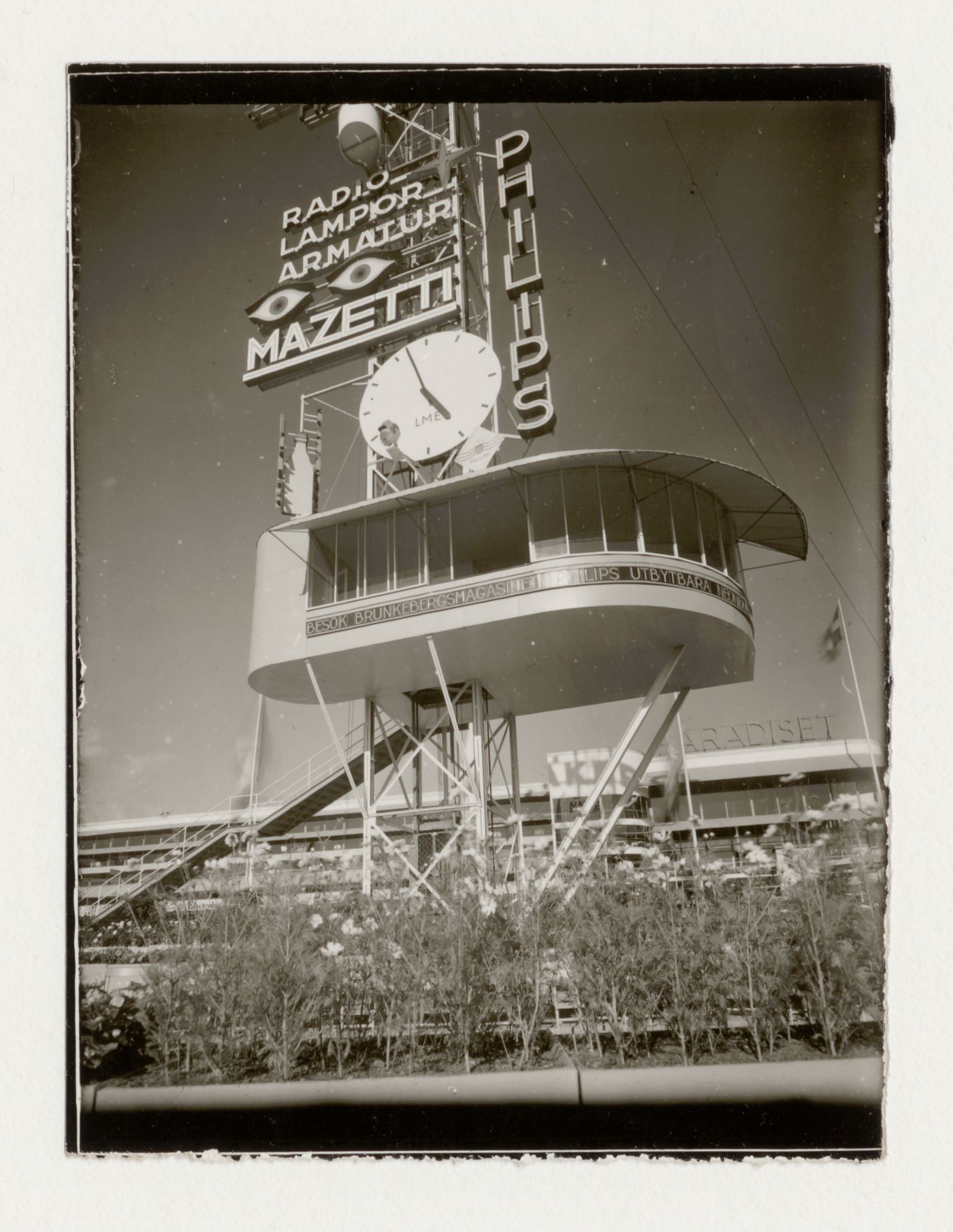 Exterior view of the base of the advertising mast and Paradise Restaurant at the Stockholm Exhibition of 1930, Stockholm