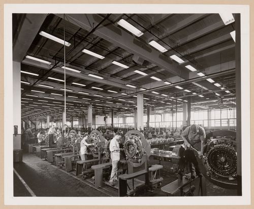 Interior view of the Motor Manufacturing Building showing workers assembling motors, Nash-Kelvinator Corporation Assembly Plant, Kenosha, Wisconsin