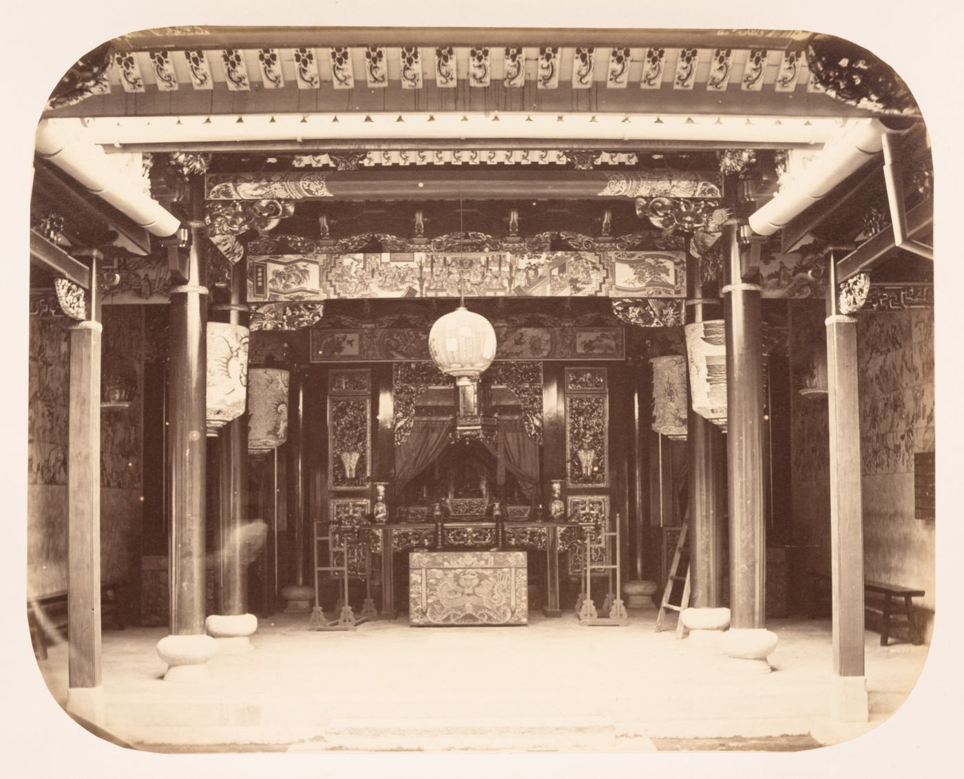 Interior view of a temple showing an altar, Padang, Sumatra, Dutch East Indies (now Indonesia)