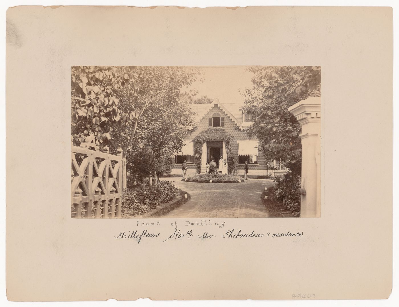 View of the gate and principal façade of Mille-Fleurs, the residence of the Honorable Mr. Thibaudeau, Montréal[?], Québec, Canada