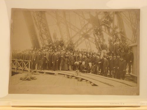 Members of the Société Centrale des Architectes on the first platform of the Eiffel Tower during its construction, Paris, France