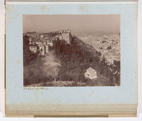 View of Alhambra, Comares tower, and Granada in the distance, from the Royal room in Generalife, Granada, Spain

