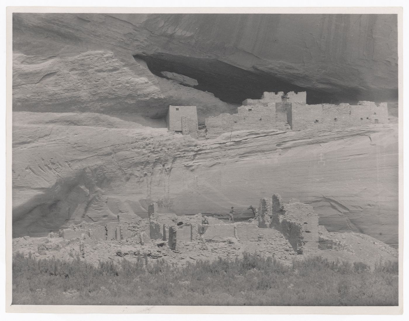 View of the White House ruins and showing a man and a horse, Canyon de Chelly, Arizona, United States