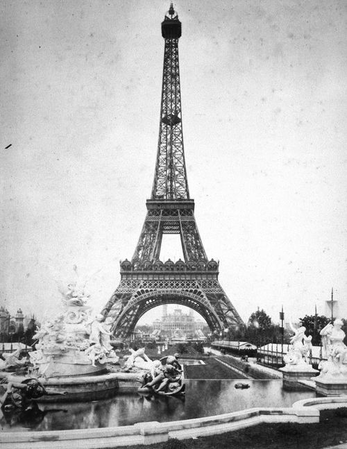 Exposition universelle de 1889 (Paris, France): View of the Eiffel Tower looking across from a fountain on the exposition grounds