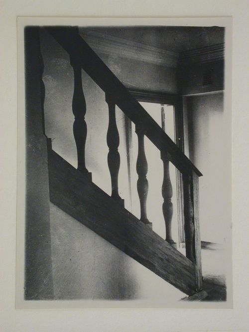 Interior view of an apartment showing a staircase balustrade, 16 Mokhovaia Street, Moscow