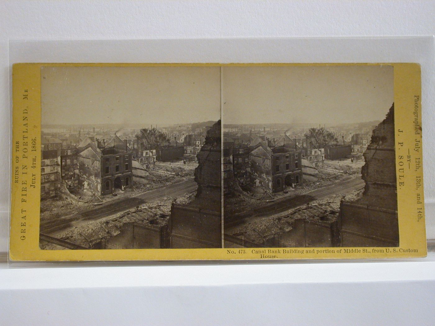 Ruins of Canal Bank Building and portion of Middle Street, as seen from U.S. Custom House, after the Great Fire in  Portland, Maine on July 4, 1866