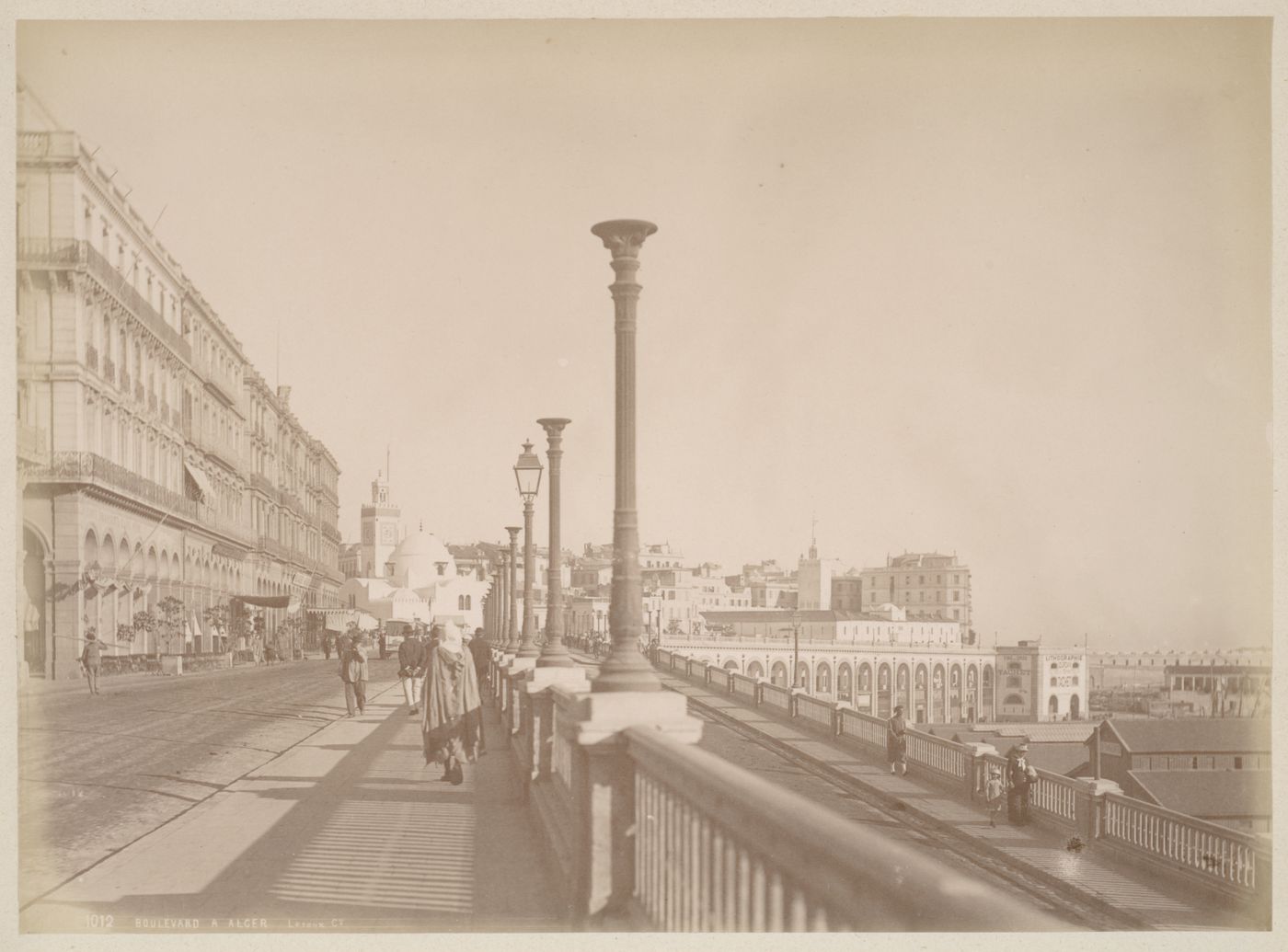 View of le boulevard de la République street with dome of Mosquée de la Pêcherie mosque, consular palace and city in the distance, Algiers, Algeria