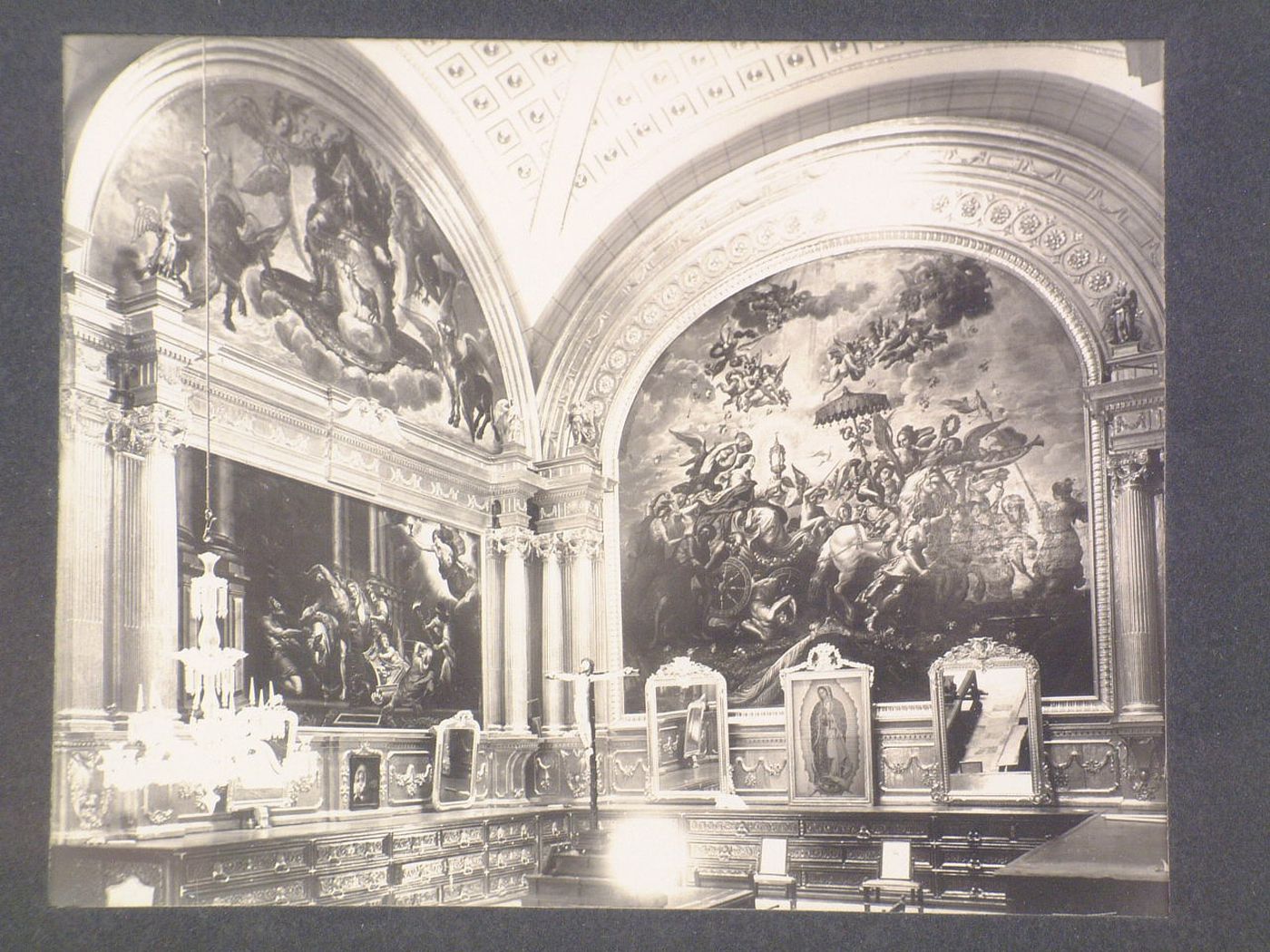 Interior view of the sacristy of the Catedral de Puebla showing paintings, including "Triumph of Faith" and "Triumph of the Church", Mexico