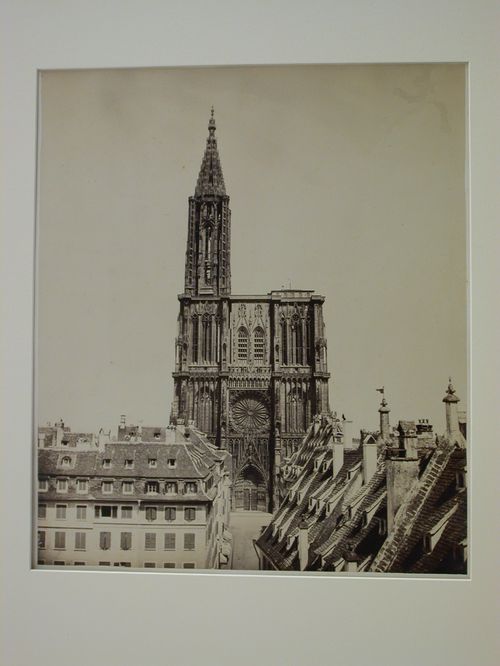 View of façade and tower of Strasbourg Cathedral, with houses in foreground, Strasbourg, France