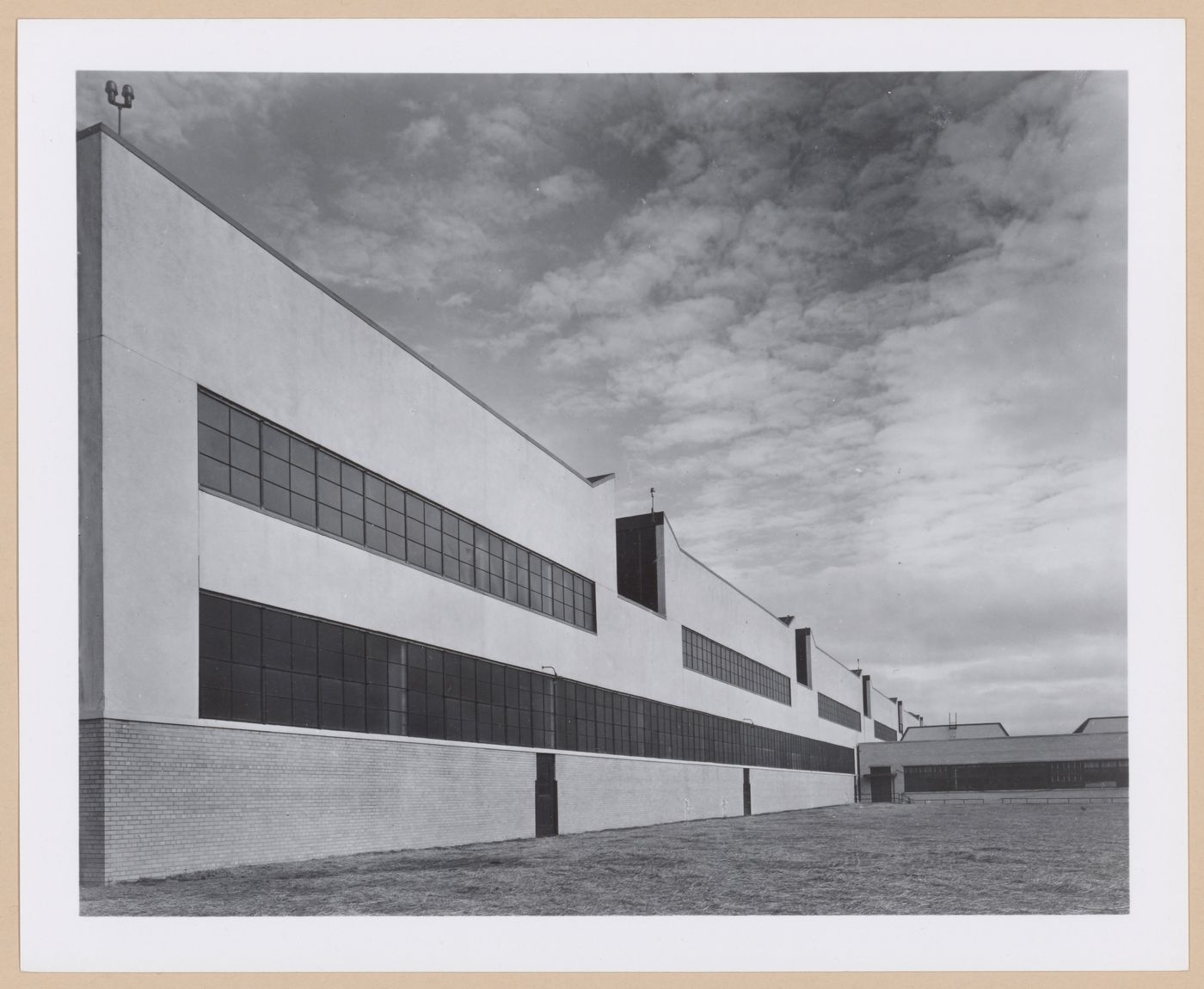 View of the lateral [?] façade of the Assembly Building and the principal [?] façade of the Engineering Building, Curtiss-Wright Corporation Airplane division Assembly Plant, Columbus, Ohio