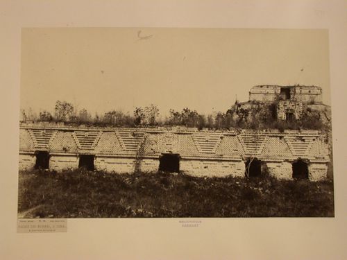 Partial view of the Nunnery Quadrangle showing the Egyptian façade with the Pyramid of the Magician (also known as Casa del Anano [House of the Dwarf]) in the background, Uxmal Site, Mexico