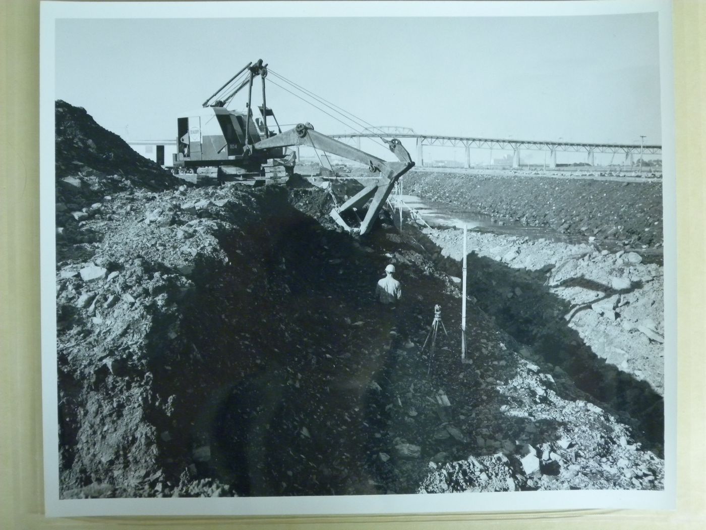 View of a power shovel in action on construction site at an early stage, Expo 67, Montréal, Québec
