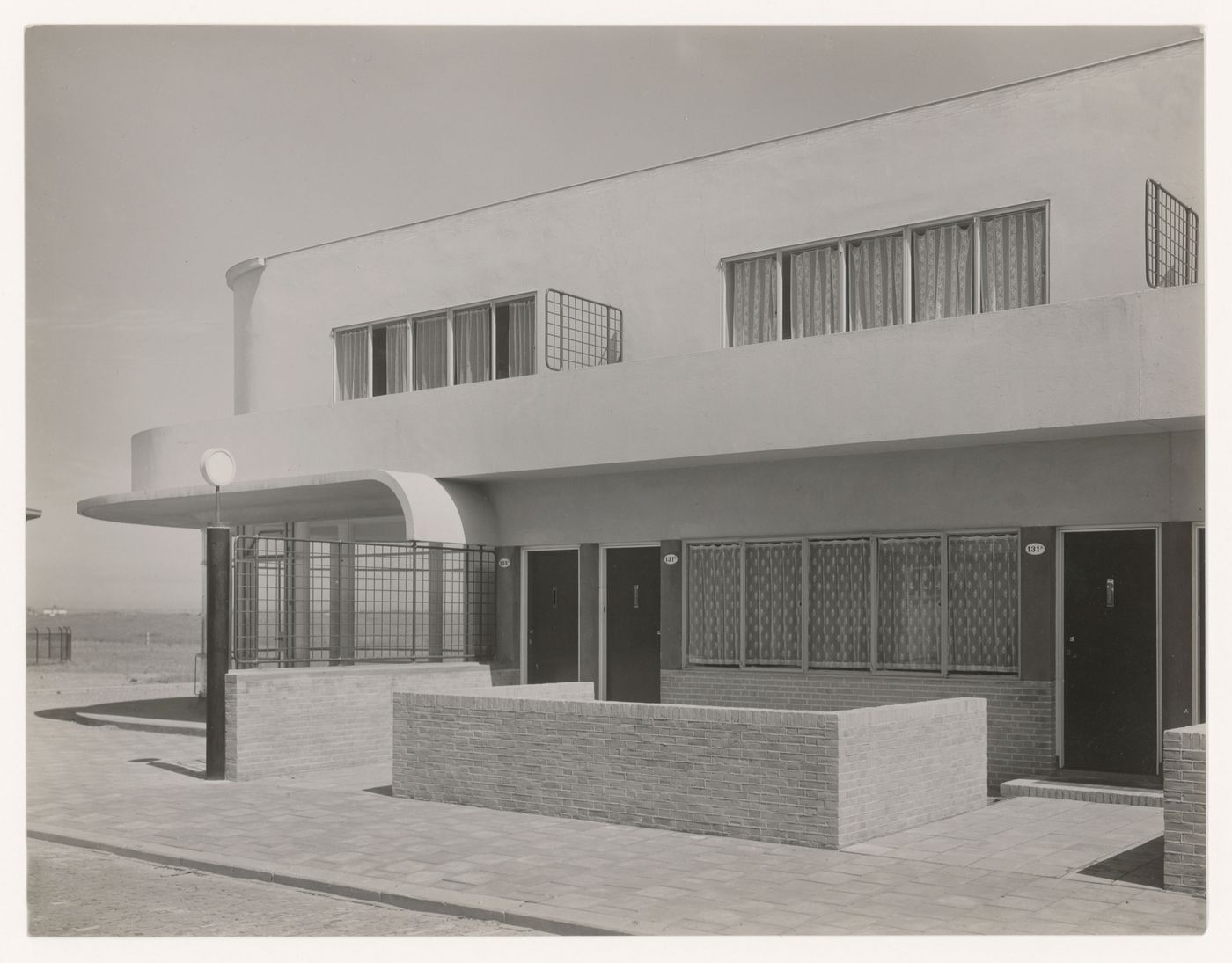 View of the principal façade of industrial row houses, Hoek van Holland, Netherlands