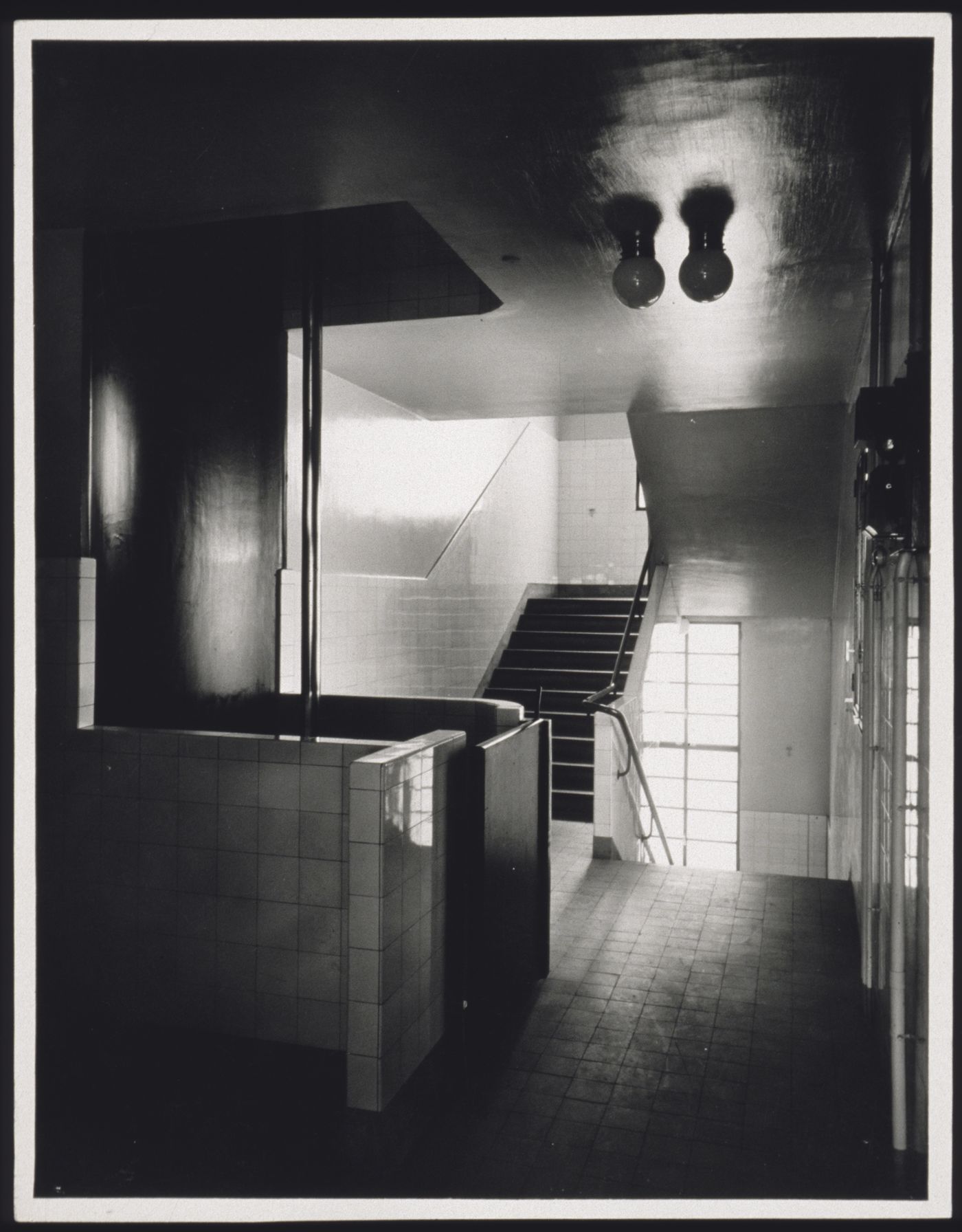 Staircase and well-hole with sliding pole, fire station, rue Mesnil, Passy district, Paris, France