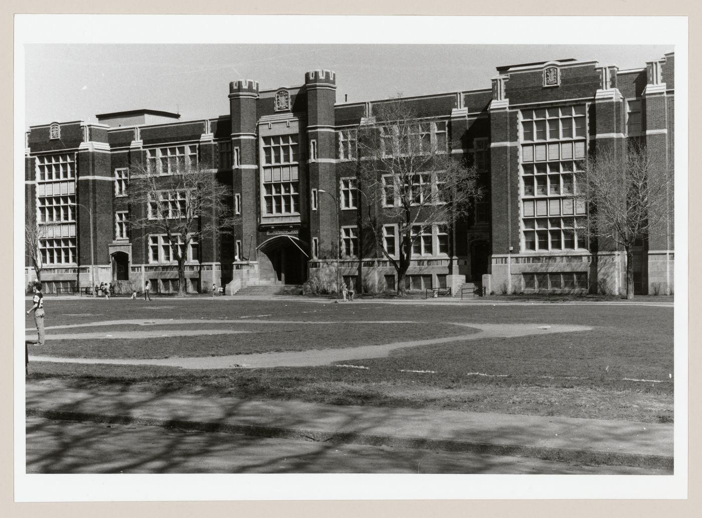 View of the principal façade of Westmount Park School with the athletic field in the foreground, 20 Academy Road, Westmount, Québec