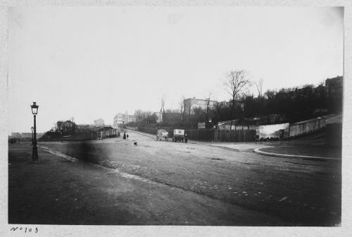 View of Durandelle's voiture on street near Basilica of Sacré-Coeur de Montmartre, Paris, France