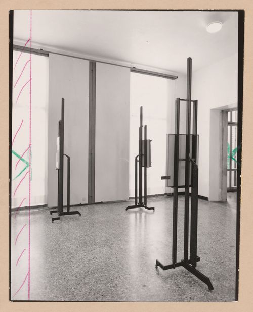 Interior view of a gallery showing paintings on easels, Museo Correr, Venice, Italy