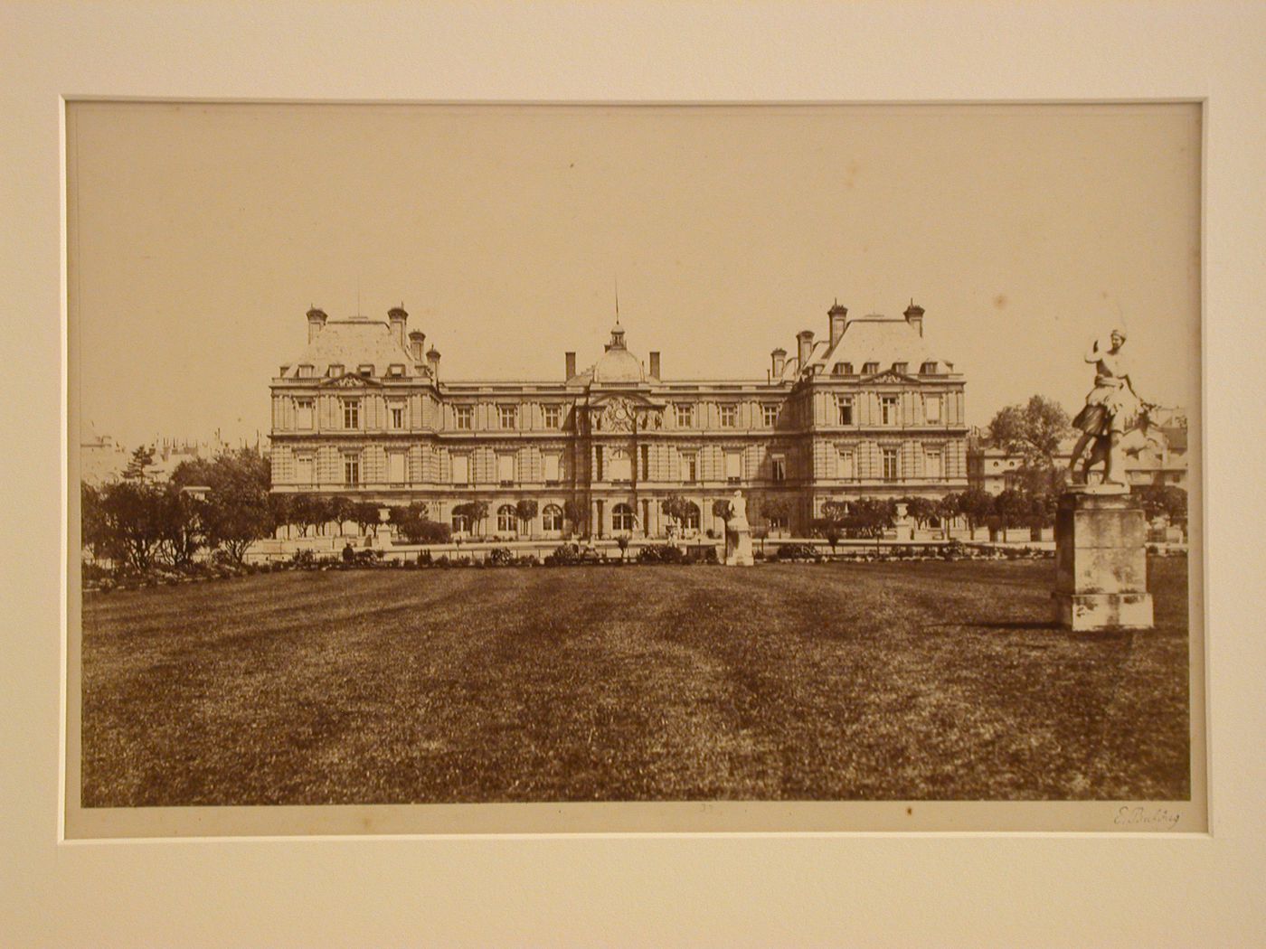 View of Palais du Luxembourg (Luxembourg Palace) with lawn and the statue "Diane à la biche" in the foreground.