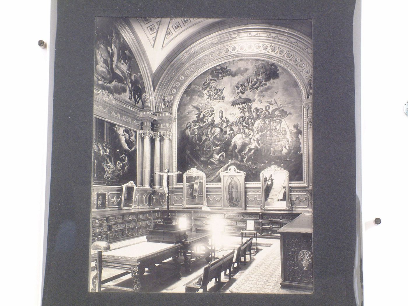 Interior view of the sacristy of the Catedral de Puebla showing paintings, including "Triumph of Faith" and "Triumph of the Church", Mexico