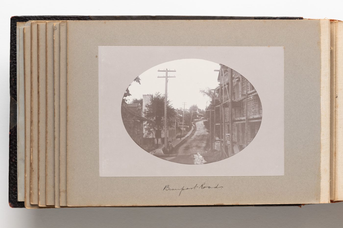 View of road identified as Beauport Road with buildings on both sides, Beauport (now Quebec City), Quebec, Canada