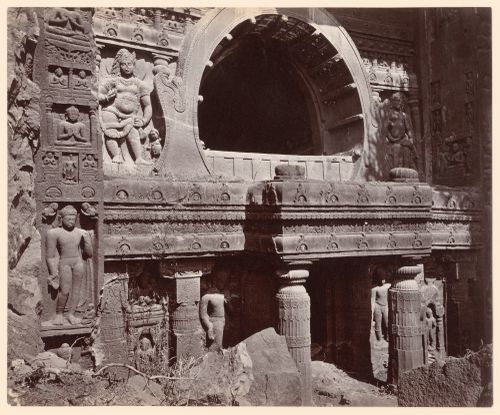 View of carved exterior of a Buddhist cave monument, Ajanta Caves, India