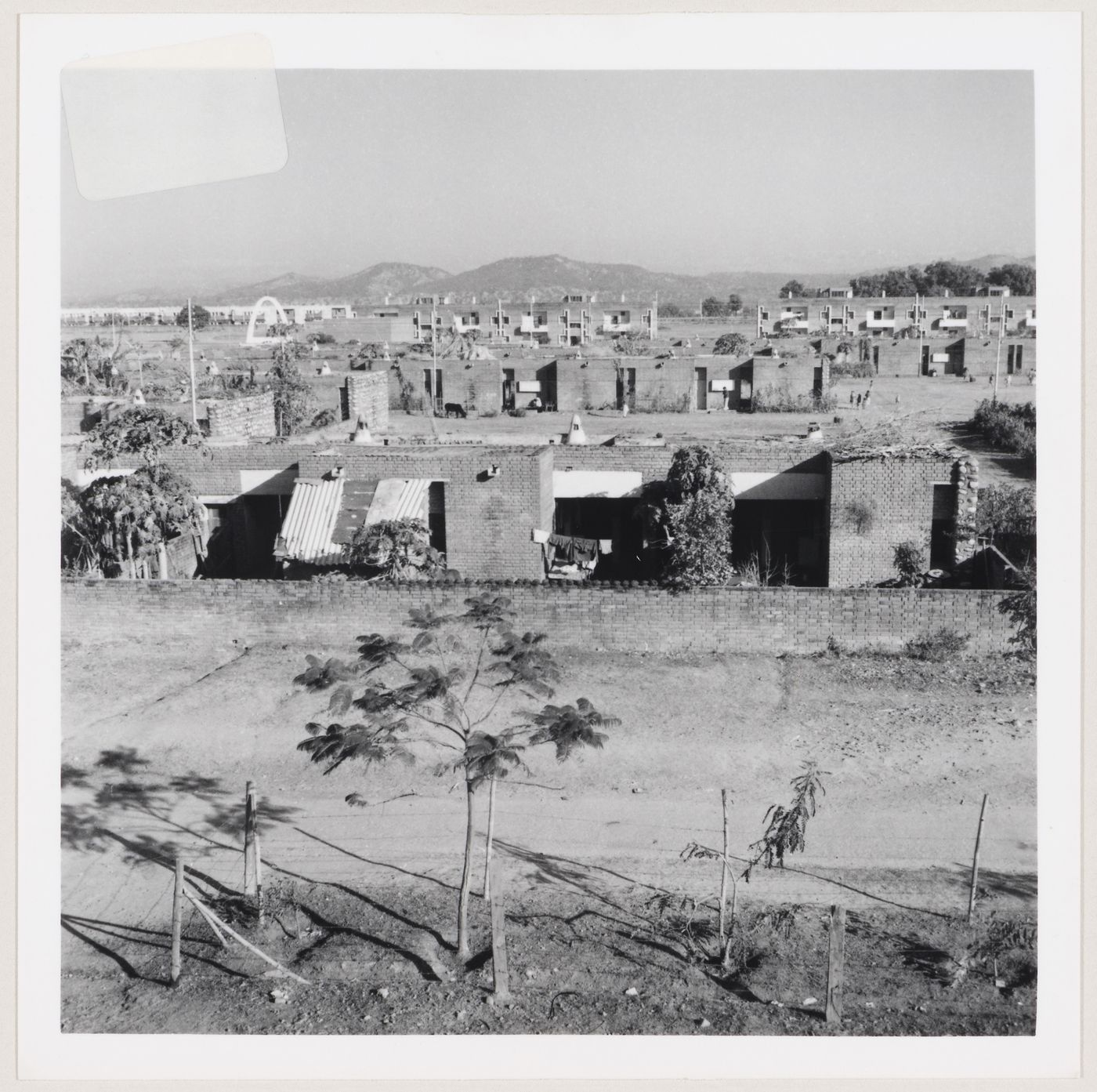 Middle income housing and a temple in Sector 3, Talwara, India