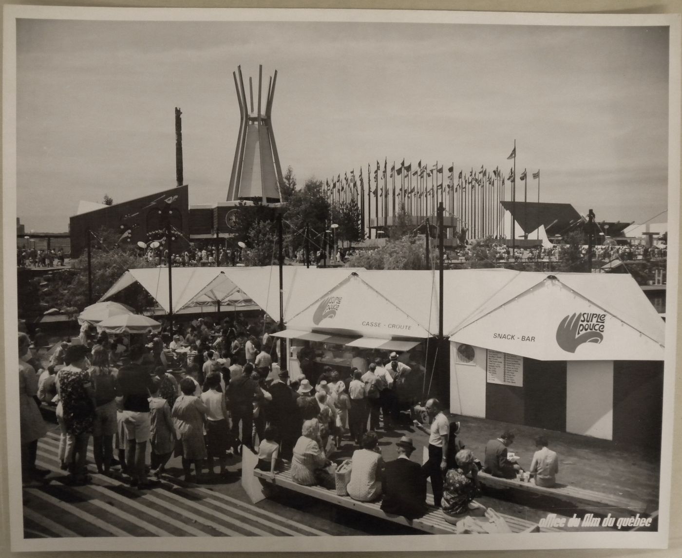 View of a snack bar with the Indians of Canada and Christian Pavilions and the Pavilion of the United Nations in background, Expo 67, Montréal, Québec