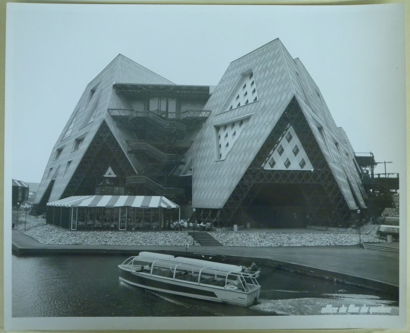 View of Man the Producer Pavilion with a vaporetto in foreground, Expo 67, Montréal, Québec