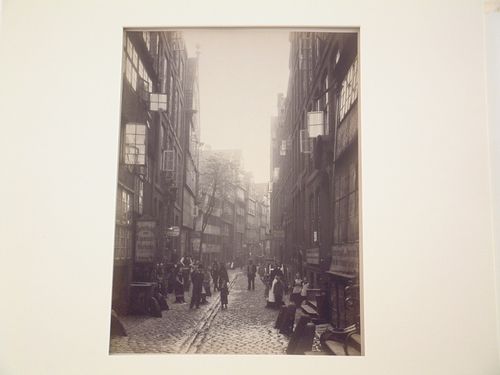 Residential small business street with crowd, Hamburg, Germany