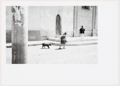 Woman with pig on leash, South America