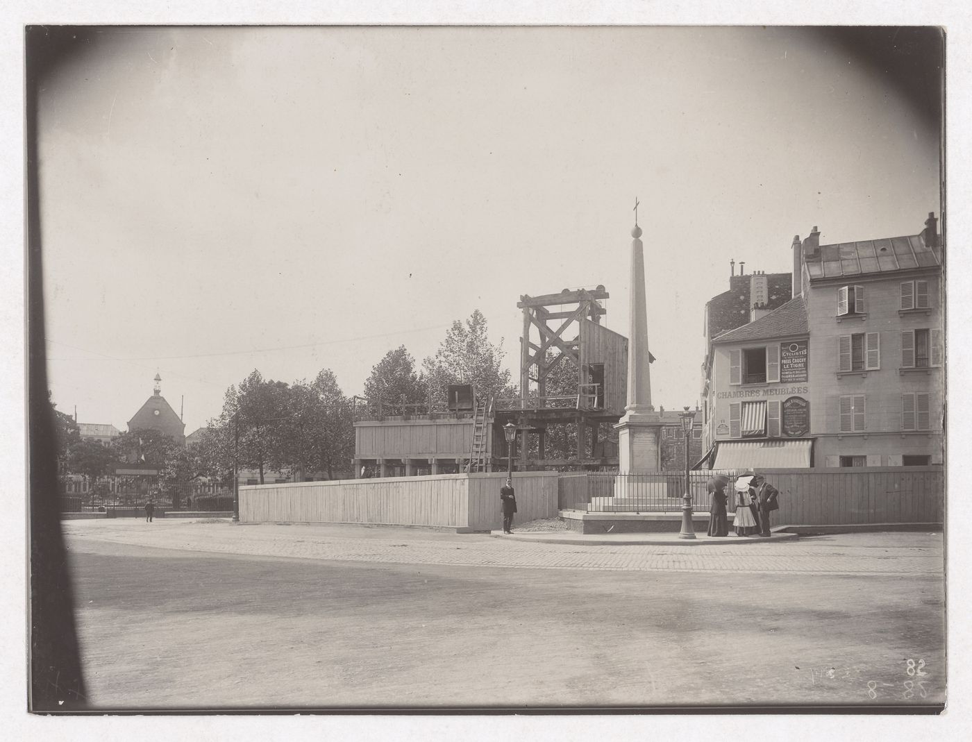 Construction of the Paris Metro, exterior view of people standing near a wooden structure, Paris, France