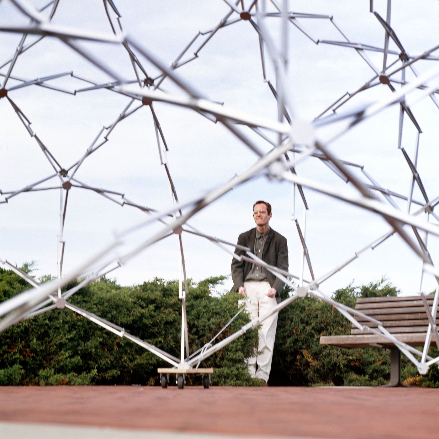 View of Chuck Hoberman through the Expanding Geodesic Dome, Liberty State Park, Jersey City, New Jersey.