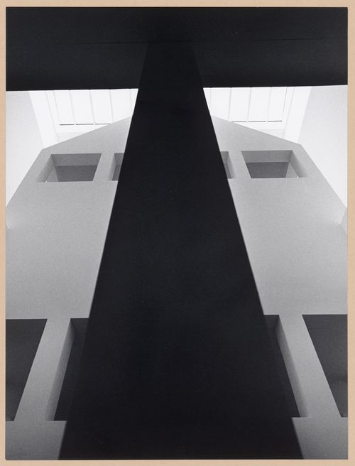 Interior view of the Deutsches Architekturmuseum [German Architecture Museum] showing a lateral façade of the third storey of the House-in-House and the skylight above from across a second level light well, Schaumainkai 43, Frankfurt am Main, Germany