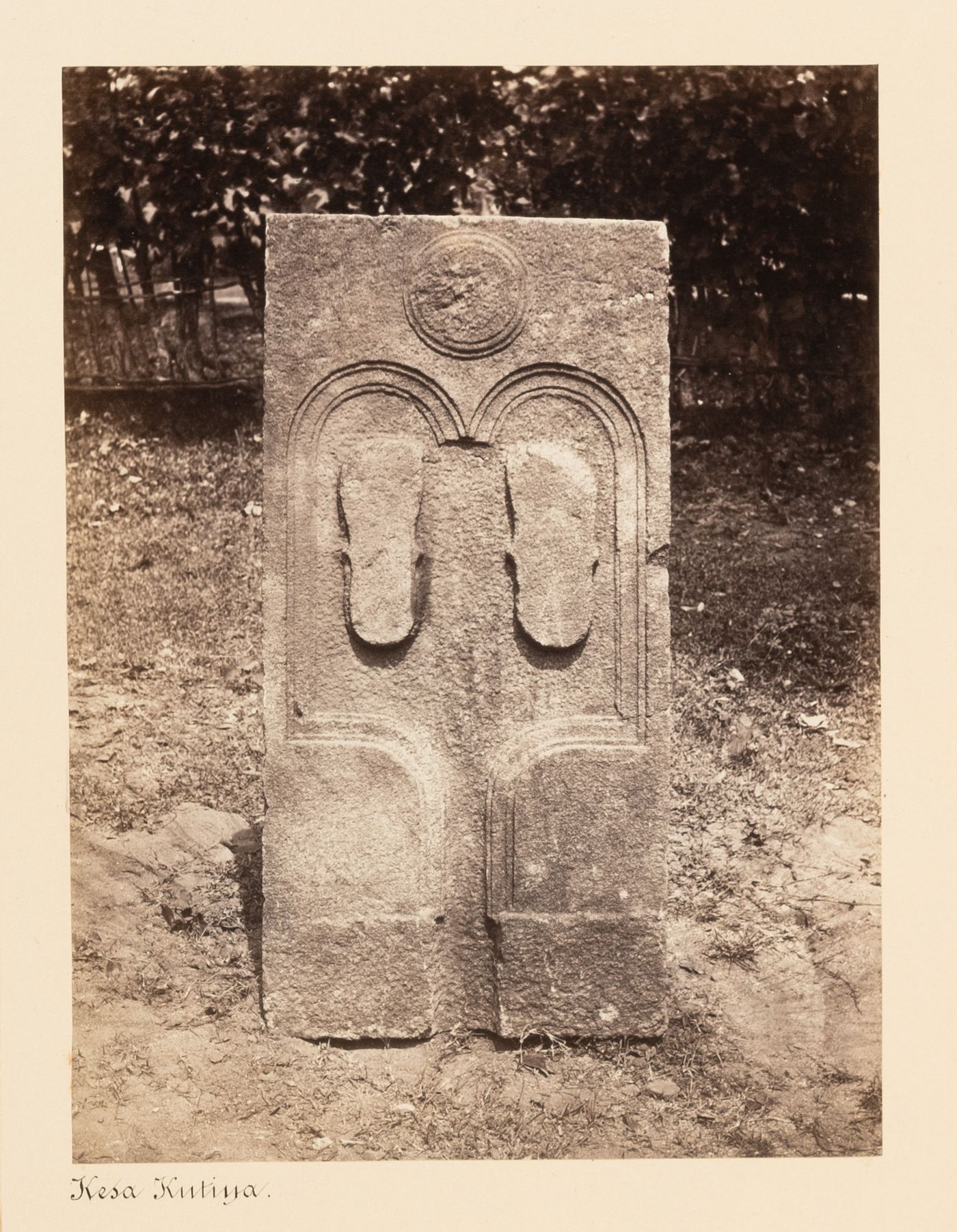Close-up view of a stele showing a bas-relief of the Buddha's footprints, Anuradhapura, Ceylon (now Sri Lanka)