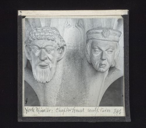 View of two sculptures of heads in Chapter House of York Minster, York, North Yorkshire, England