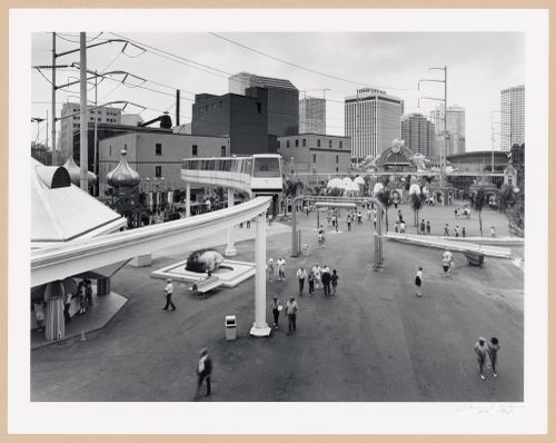 View of the Monorail train with "The Source" sculpture below and the City Gate in the background, Louisiana World Exposition, New Orleans