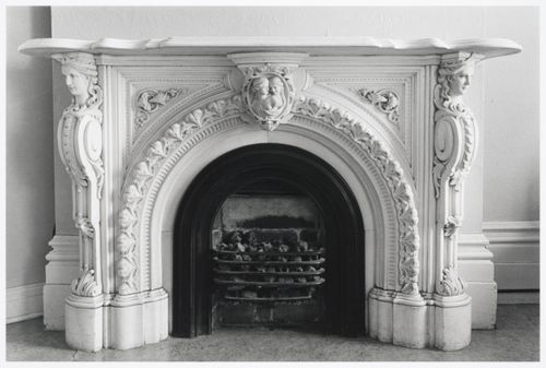 Interior view of the marble fireplace in a front room in the west part of Shaughnessy House (now the Grand Salon ?), Montréal, Québec