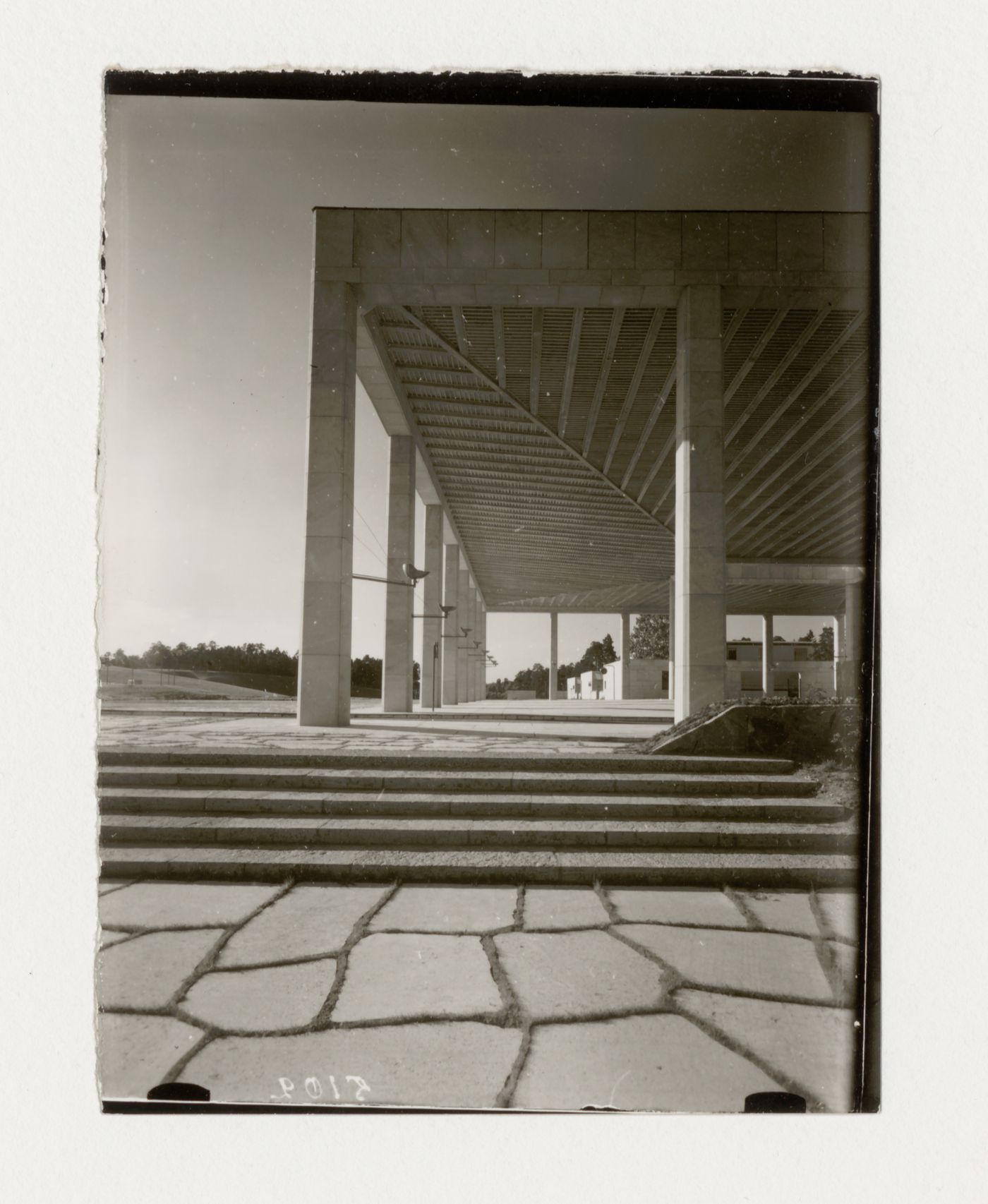 Exterior view of the ceremonial plaza, the loggia of Monument Hall and the Way of the Cross walkway, Woodland Crematorium and Cemetery, Stockholm