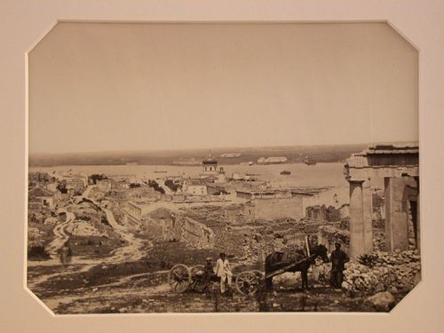 View of Sevastopol showing the harbor and the ruins of the Church of St. Peter and St. Paul on the right and Nikolski Cathedral in the background, Russia (now in Ukraine)