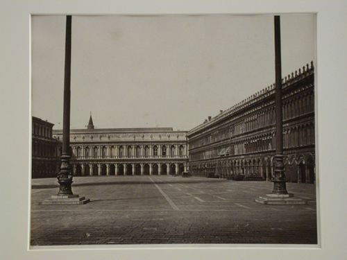 Piazza San Marco, view with bronze flagstaffs in foreground, Venice, Italy