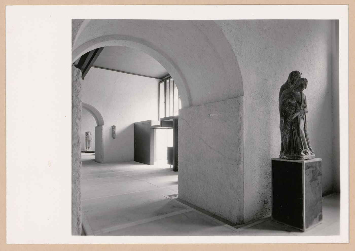Interior view of a gallery showing statues, doorways and an entrance, Museo di Castelvecchio, Verona, Italy